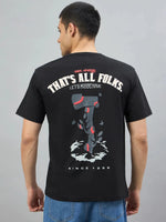 Man in a 98degreenorth black oversized T-shirt featuring “Burn It Down” back print by 98 Degree North.