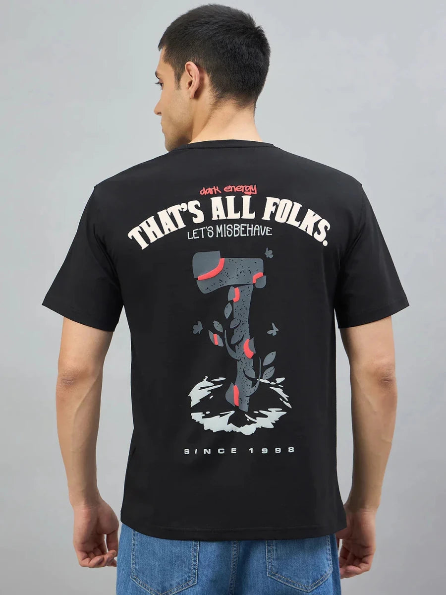 Man in a 98degreenorth black oversized T-shirt featuring “Burn It Down” back print by 98 Degree North.