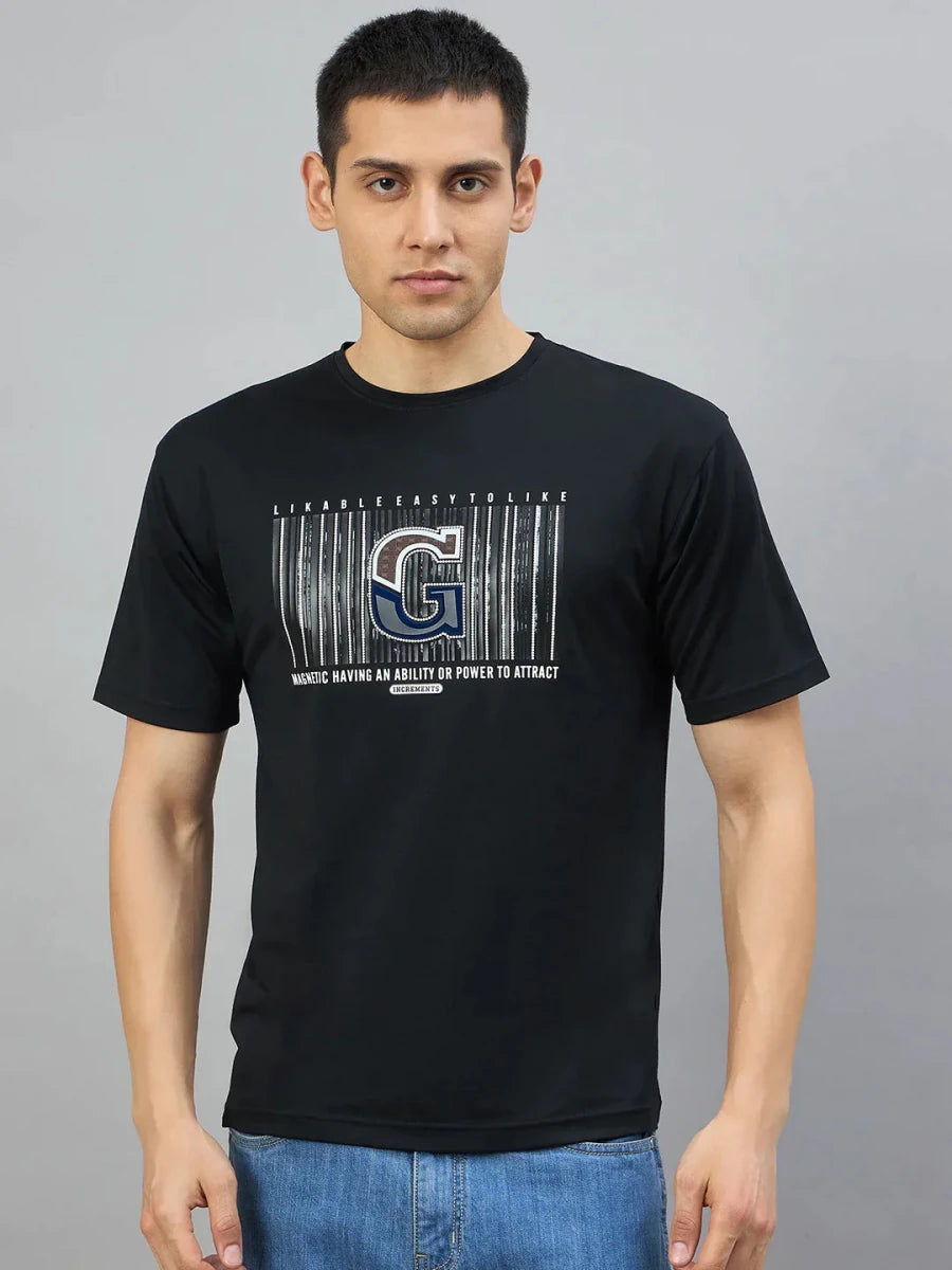 Man in a 98degreenorth Men's Black Magnetic Graphic T-Shirt, Cotton Lycra, against a plain gray background.