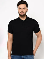 Man wearing 98degreenorth men's black stretch cotton pique polo with chest pocket, standing against a white background.