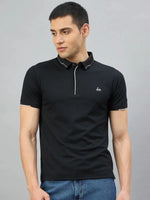 Man in 98degreenorth Men's Black Polo T-Shirt with White Tipping and LA logo, paired with blue jeans.