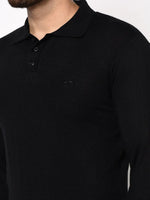 Man wearing 98degreenorth Men’s Black Premium Merino Wool Polo Neck Sweater—luxury winter knit for workwear & travel.