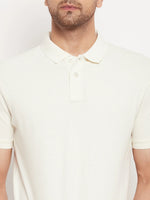 Man in 98degreenorth Butter Yellow Striped Pique Knit Polo, shown from shoulders to waist against a white background.