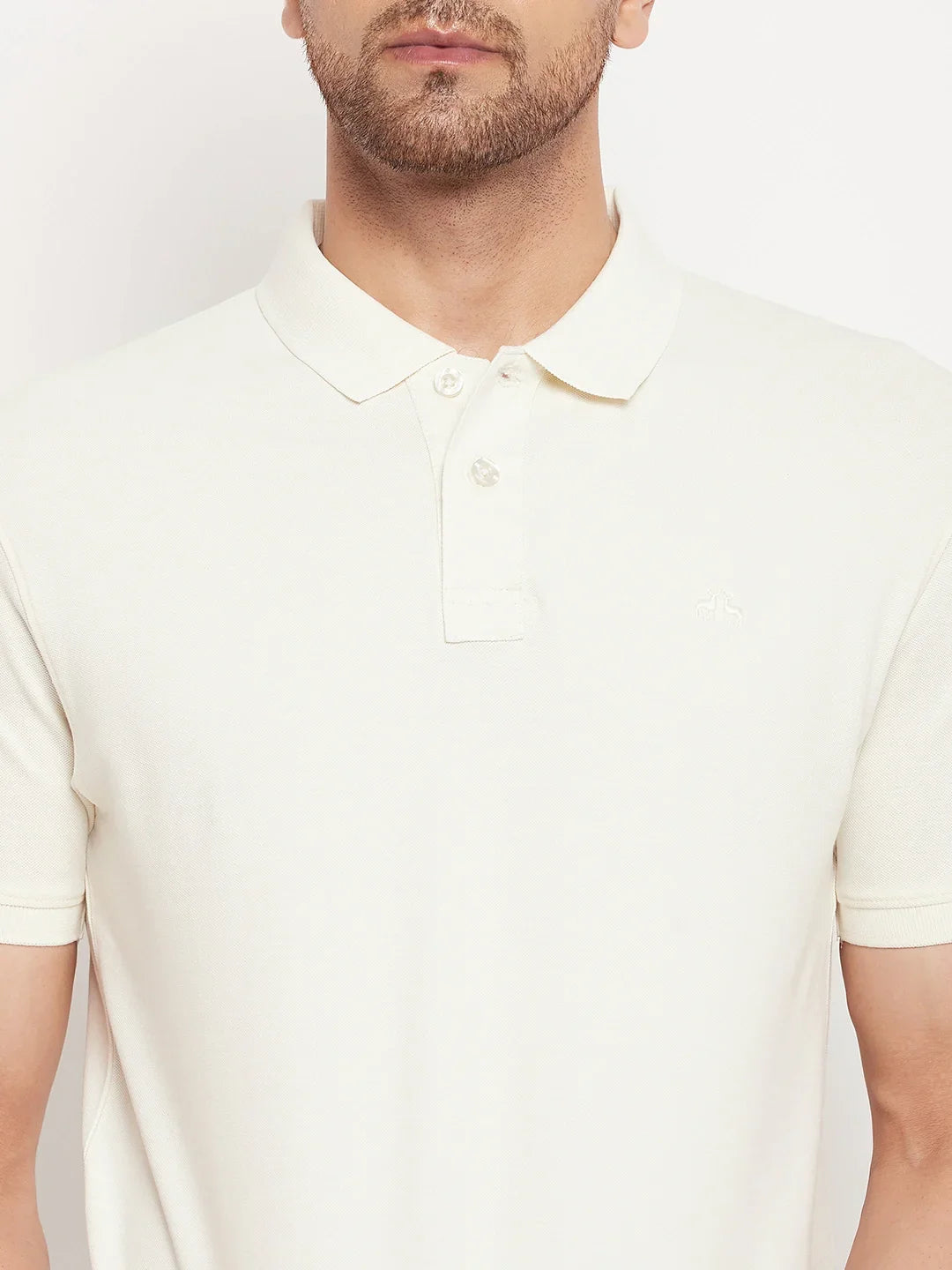 Man in 98degreenorth Butter Yellow Striped Pique Knit Polo, shown from shoulders to waist against a white background.