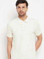 Man wearing a 98degreenorth Butter Yellow Vertical Striped Pique Polo T-Shirt, standing against a white backdrop.