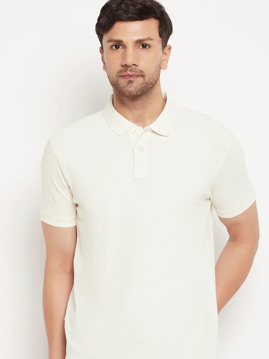 Man wearing a 98degreenorth Butter Yellow Vertical Striped Pique Polo T-Shirt, standing against a white backdrop.