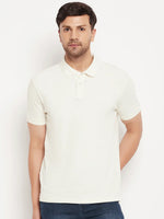 Man wearing 98degreenorth's butter yellow vertical striped polo T-shirt, pique knit, against a white background.