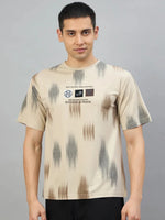 Man wearing 98degreenorth Men's Camel Abstract Ikat Print T-Shirt, Cotton Lycra, against a gray background.