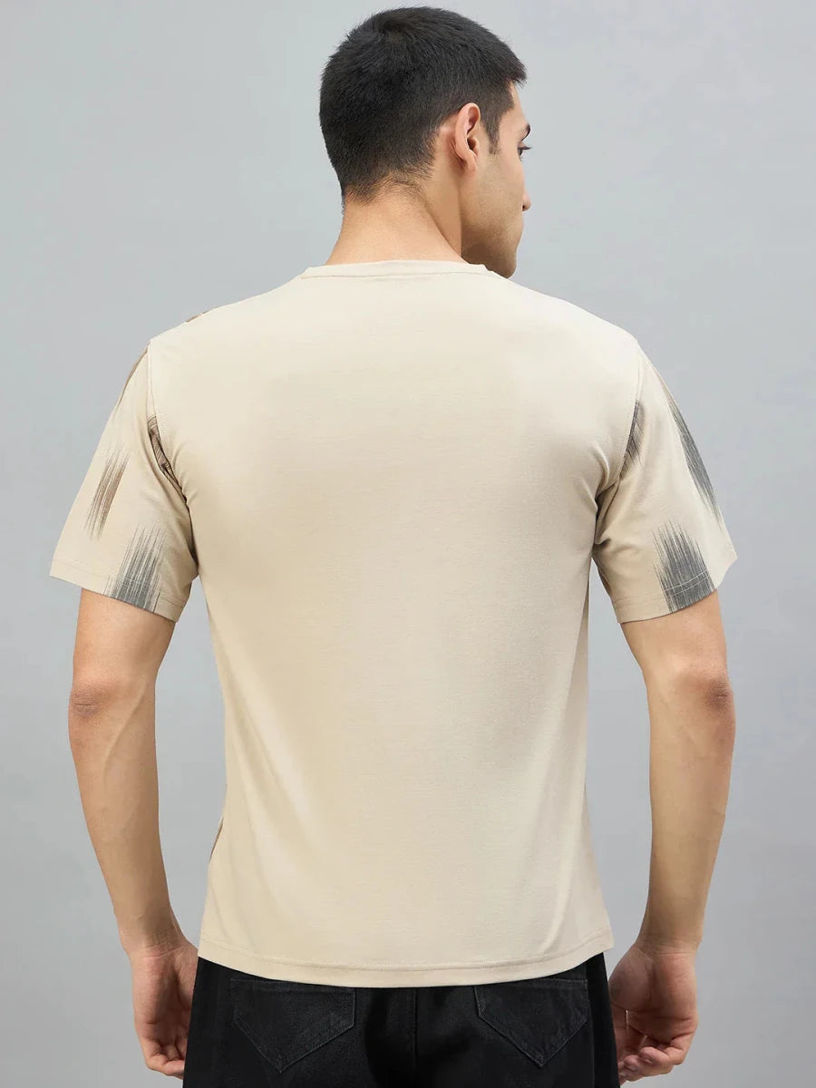 A man faces away in a 98degreenorth Men's Camel Abstract Ikat Print T-Shirt—Cotton Lycra.