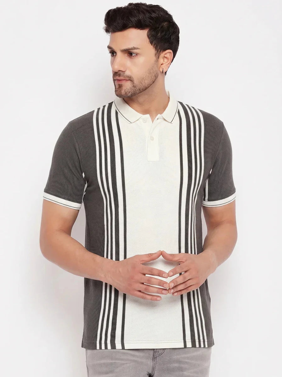 Man wearing 98degreenorth Men's Charcoal Grey Vertical Striped Polo T-Shirt, standing against a plain background.