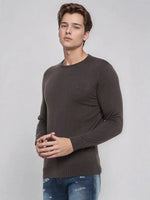 A man models the 98degreenorth Men’s Charcoal Merino Wool Sweater, perfect for office and evening winter wear.