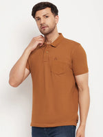 Man in 98degreenorth Men's Copper Polo T-Shirt—Pure Cotton Pique, Chest Pocket—against white background.