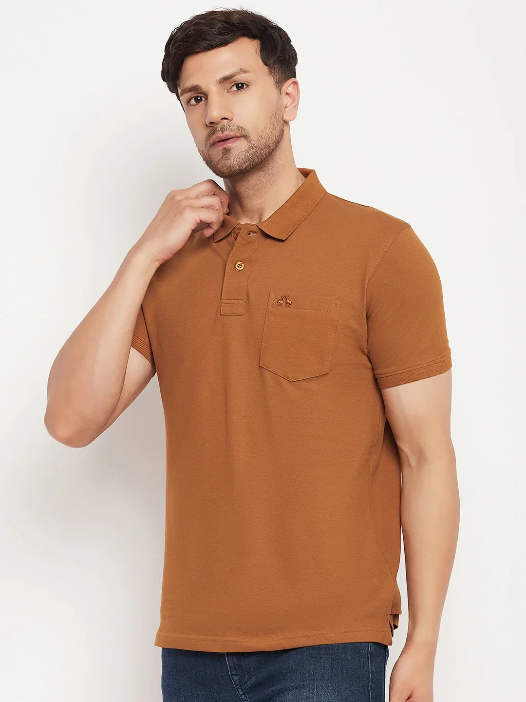 Man in 98degreenorth Men's Copper Polo T-Shirt—Pure Cotton Pique, Chest Pocket—against white background.