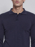 Man in a 98degreenorth Men’s Dark Denim Merino Wool Polo Neck Sweater, a smart casual handcrafted pullover.