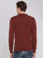 Man wears 98degreenorth Men’s Dark Maroon Merino Wool Polo Neck Sweater, standing with his back to a plain background.
