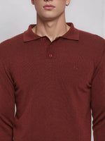 A man wears a 98degreenorth Dark Maroon Merino Wool Polo Neck Sweater, a luxe winter pullover for work or casual.