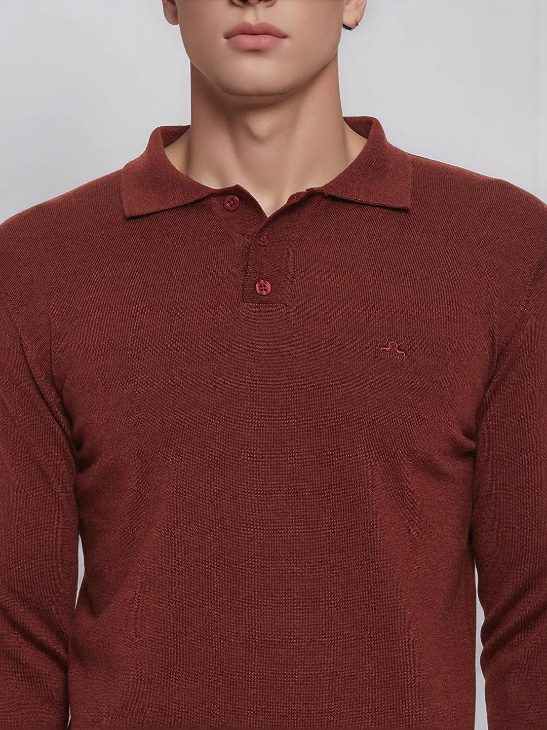 A man wears a 98degreenorth Dark Maroon Merino Wool Polo Neck Sweater, a luxe winter pullover for work or casual.