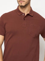 98degreenorth Men's Dark Rust Polo—stretch cotton pique, chest pocket, small logo.
