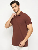 Man in 98degreenorth men's dark rust stretch cotton pique polo with chest pocket, against a white background.