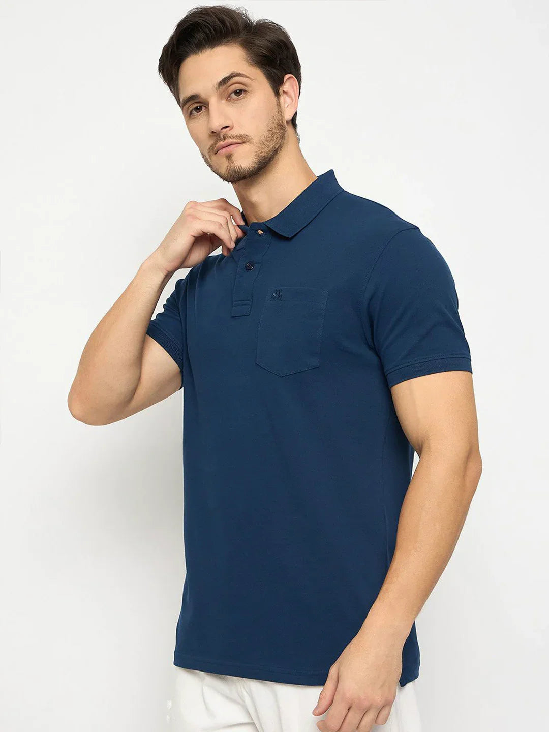 Man in 98degreenorth Men's Denim Blue Pure Cotton Pique Polo with Chest Pocket, against a white background.