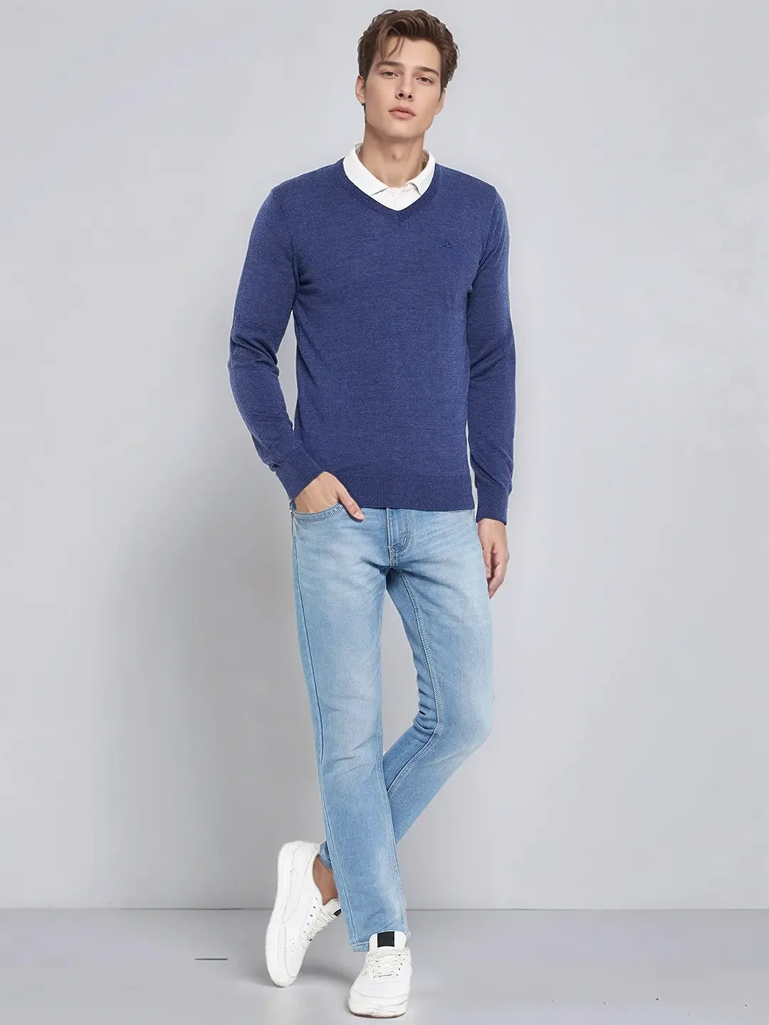 The 98degreenorth Men’s Light Denim Merino Wool V-Neck Sweater is the smart office style essential.