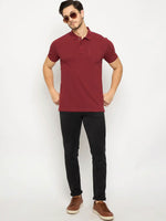 Man wears 98degreenorth maroon stretch cotton pique polo with chest pocket—an essential look for men.