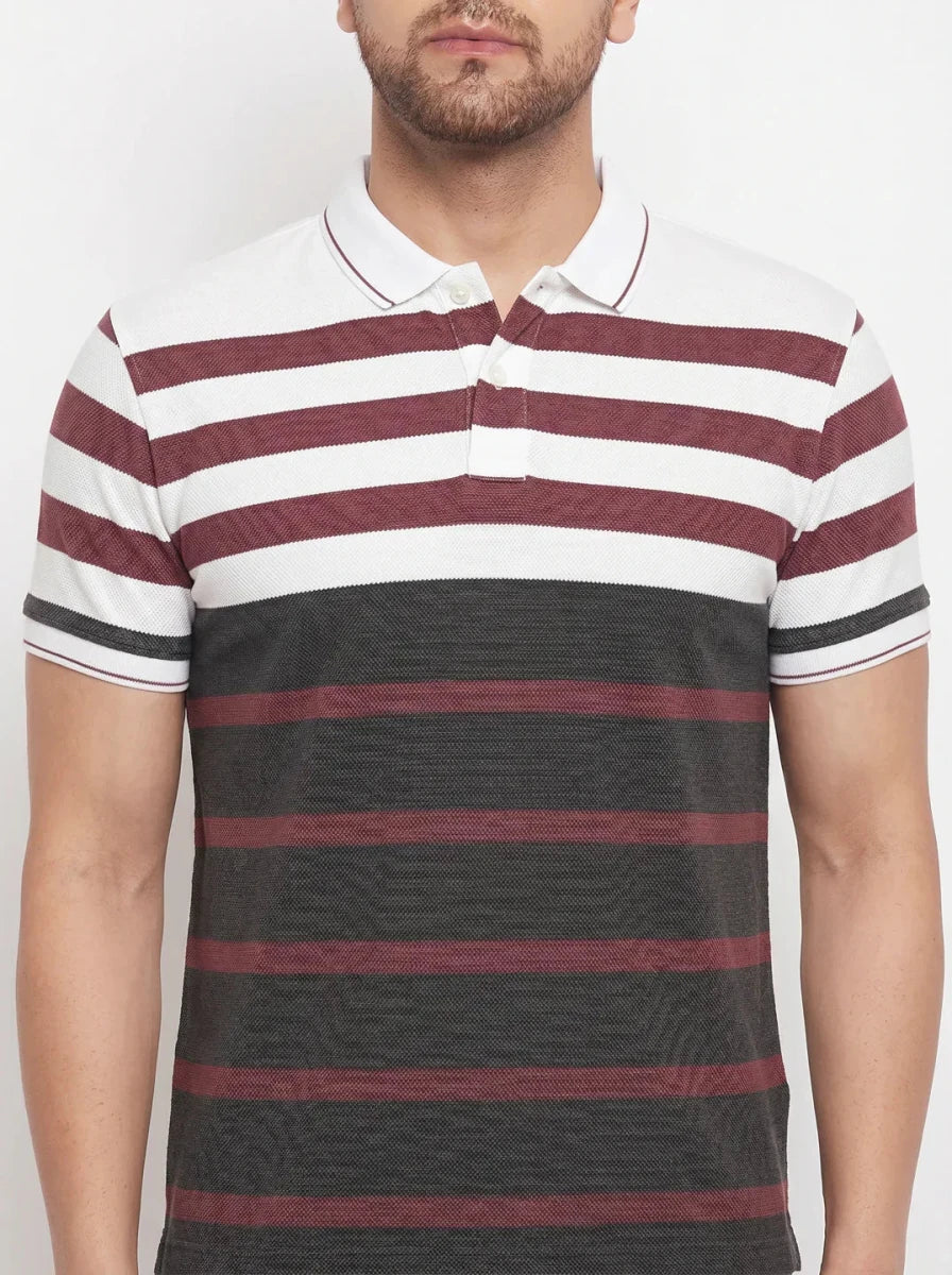 Man wears 98degreenorth Men's Mauve Olive Striped Polo T-Shirt in soft pique knit with bold maroon, white, black stripes.