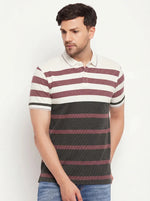 Man wears 98degreenorth Men's Mauve Olive Striped Polo T-Shirt with blue jeans, standing against a white background.