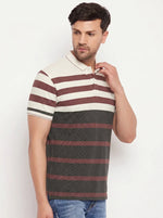 Man in 98degreenorth Men’s Mauve Olive Bold Stripe Pique Polo T-Shirt with blue jeans; soft cotton pique knit.