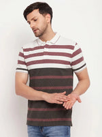 Man wears 98degreenorth Men's Mauve Olive Striped Pique Polo T-Shirt, standing with hands apart against white background.