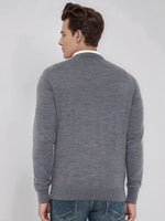 A man wears a 98degreenorth Men's Medium Grey Merino Wool V-Neck Sweater, back to camera, on a light background.