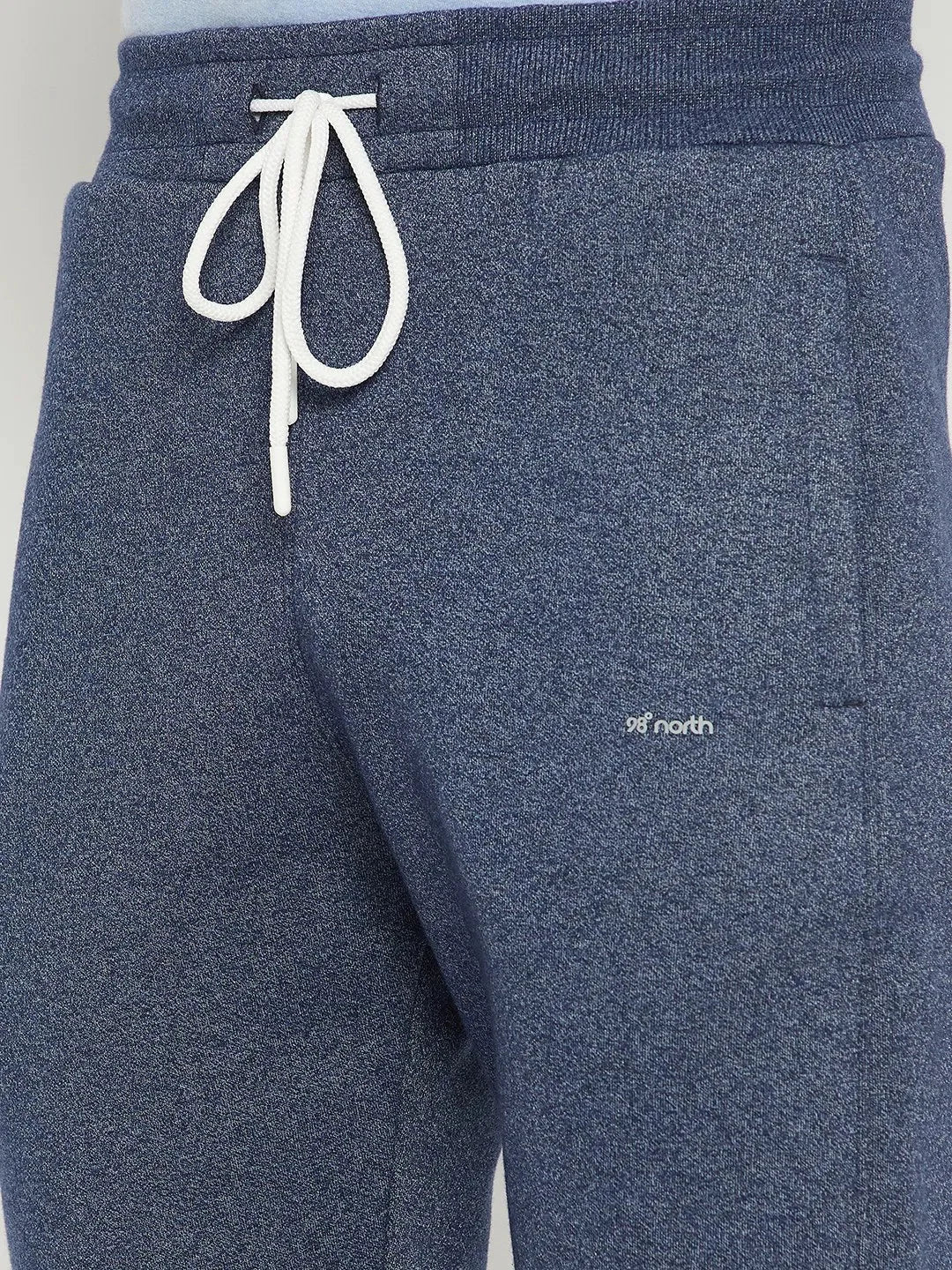 Close-up of 98degreenorth Men’s Navy Jaspe Fleece Trackpants—ultra-soft lounge pants with a drawstring waist.