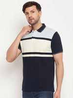Man in 98degreenorth Men's Navy Sky Blue Colour Block Polo T-Shirt—Pique Knit, standing against a plain background.