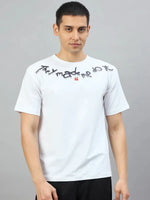 Man in 98degreenorth Off-White Oversized T-Shirt with "They Made Me Do It" graphic near the collar.