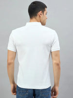 A man in a 98degreenorth Off-White Popcorn Knit Quarter Zip Polo faces away in front of a gray background.
