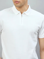 Man wearing 98degreenorth Men's Off-White Quarter Zip Popcorn Knit Polo T-Shirt, set against a gray background.