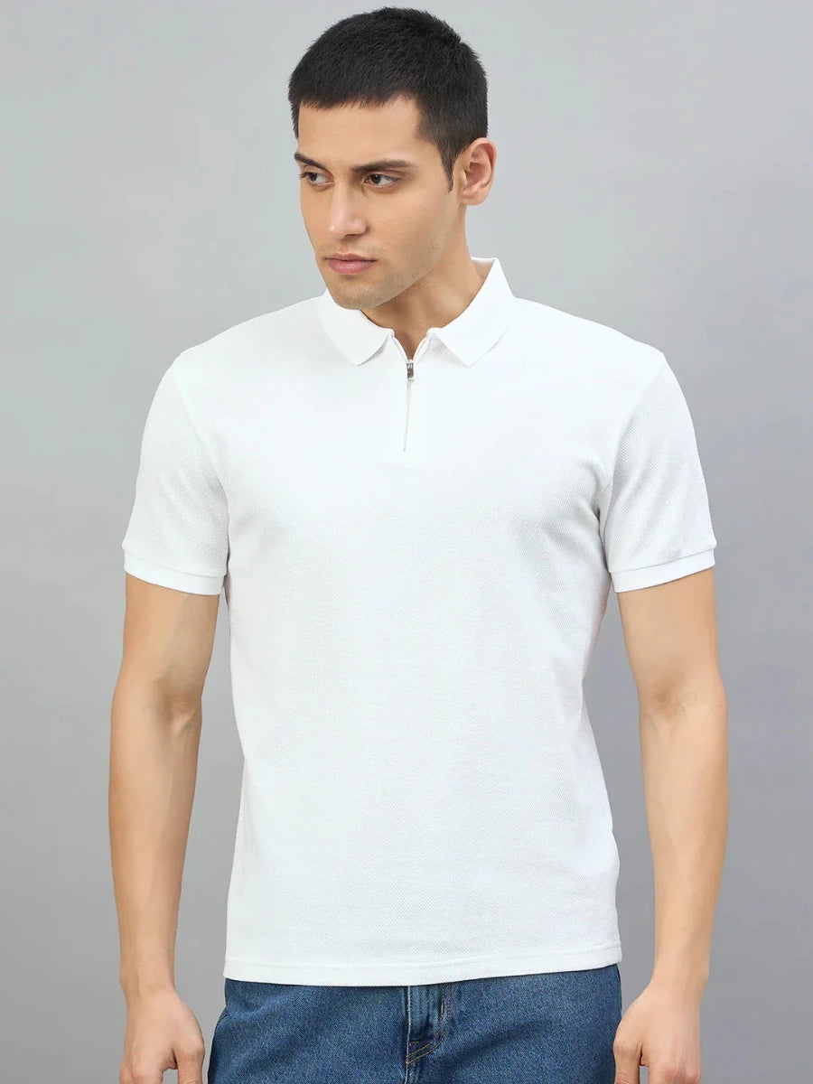 Man wears 98degreenorth Men's Off-White Quarter Zip Polo T-Shirt—Popcorn Knit—against a plain gray background.
