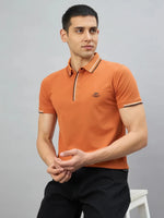 Man in 98degreenorth Men's Orange Polo T-Shirt—Handmade Series, contrast tipping; suits Indian skin tones.