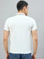 Man models the 98degreenorth Handmade Series Men's White Polo T-Shirt with contrast tipping, seen from the back.