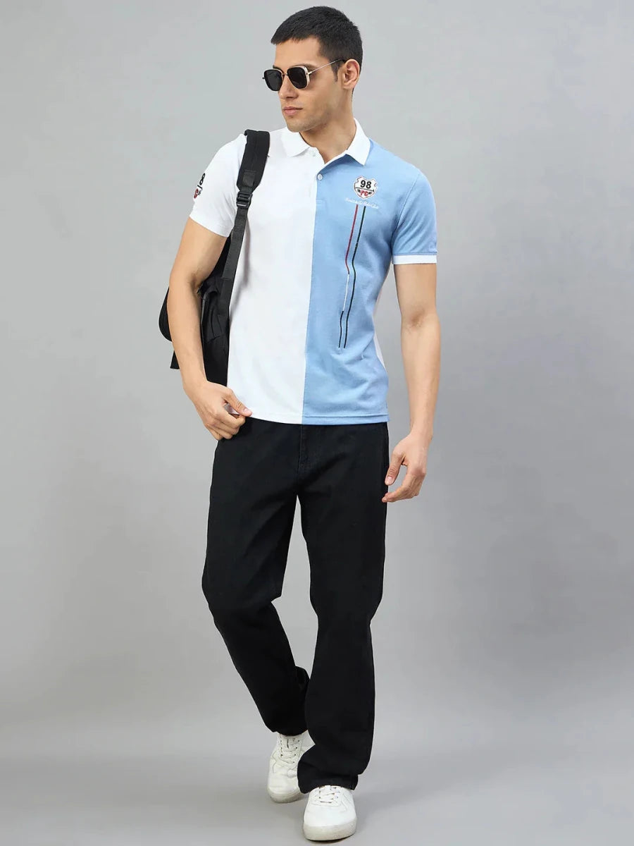Man in 98degreenorth White Sky Blue Colour Block Polo T-Shirt, sunglasses, black pants, white shoes, and black backpack.