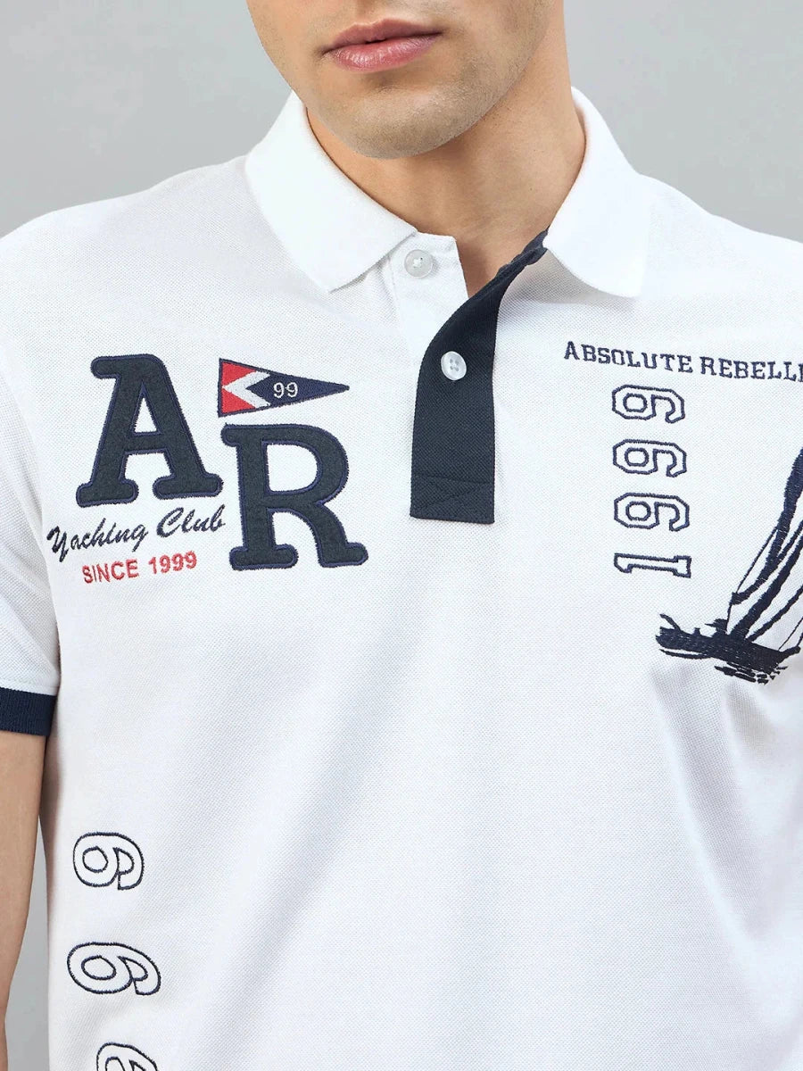 Man wears 98degreenorth Men's White Yachting Club Polo T-Shirt with nautical embroidery and club text.