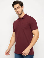 Man wears 98degreenorth Men's Wine Polo T-Shirt—Stretch Cotton Pique with chest pocket, on white background.