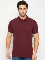 Man in 98degreenorth Men's Wine Polo T-Shirt—Stretch Cotton Pique with Chest Pocket, against a plain light background.