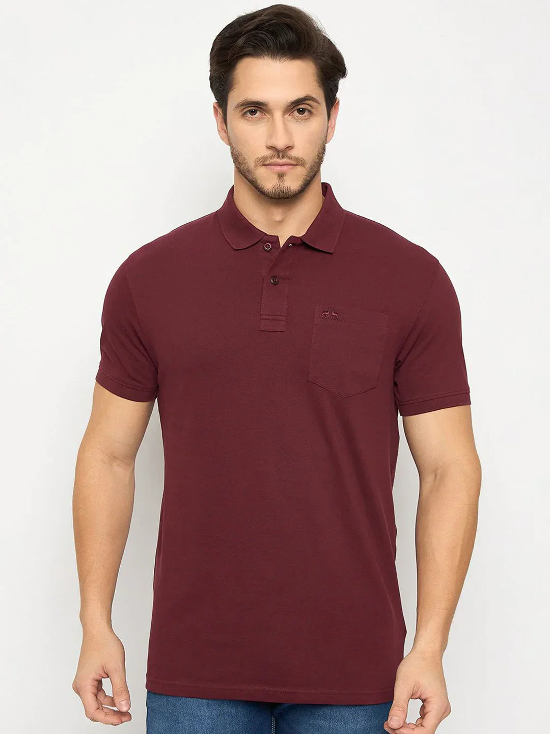 Man in 98degreenorth Men's Wine Polo T-Shirt—Stretch Cotton Pique with Chest Pocket, against a plain light background.