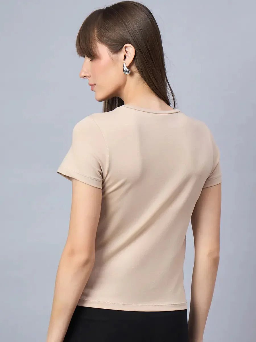 Woman with straight brown hair wears a 98degreenorth typography print cotton tee, shown from behind.
