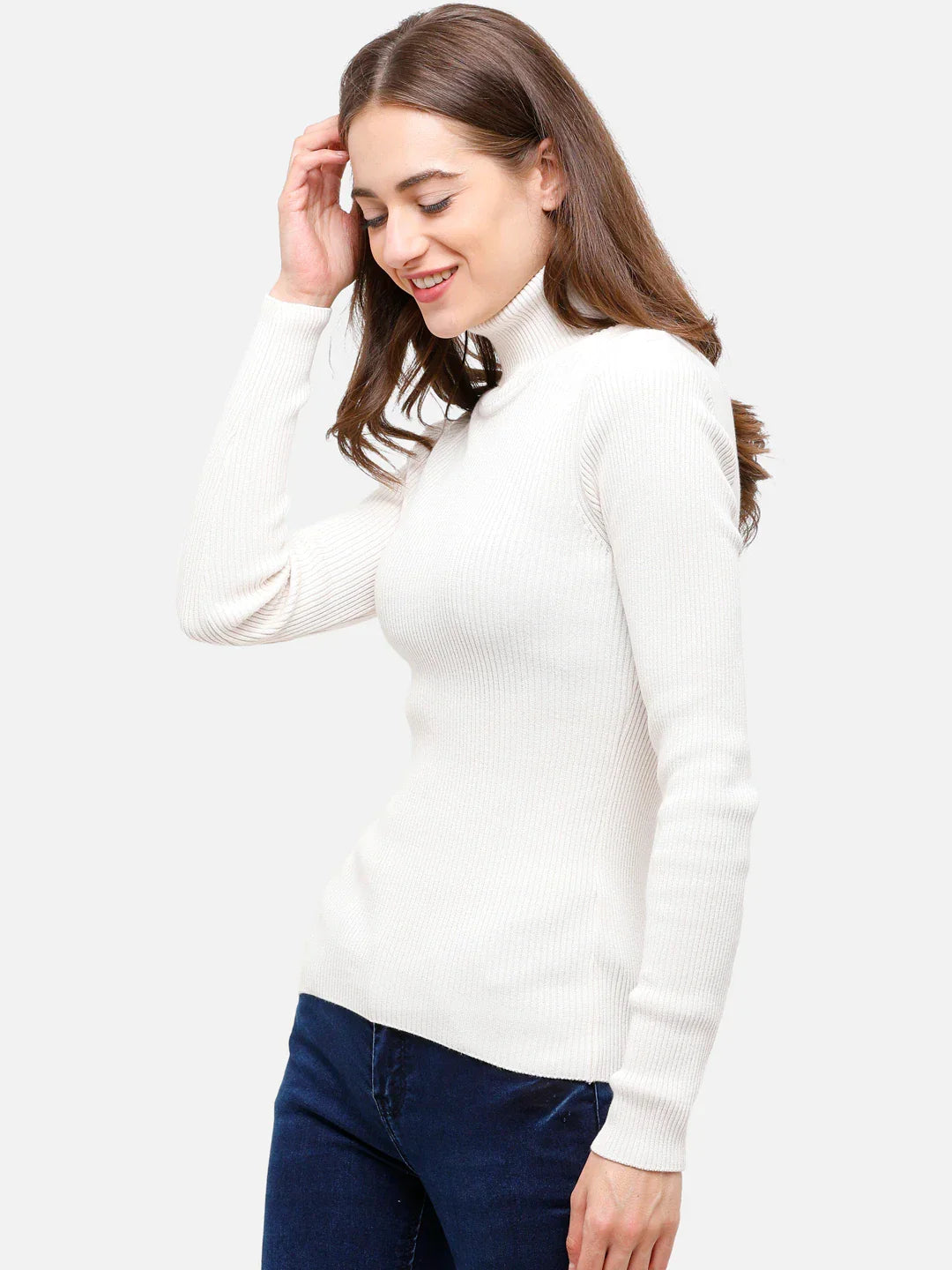 Woman wears 98degreenorth Off White Ribbed Turtle Neck Sweater—stretchable, slim fit knit top—smiling on plain background.