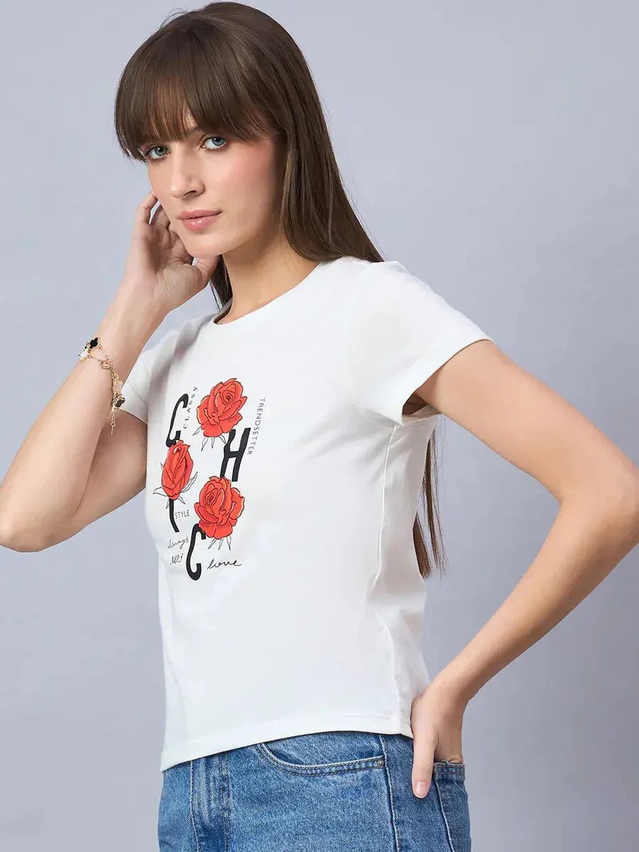Woman with straight brown hair in 98degreenorth round-neck cotton tee with bold typography, styled for daily wear.