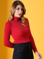 Woman wears 98degreenorth's Scarlet Red Ribbed Turtleneck Sweater—stretchable, slim fit, perfect for festive winter fashion.