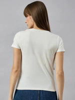 Woman with long brown hair wears 98degreenorths stylish typography cotton tee and blue jeans, shown from the back.