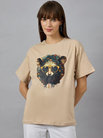 Woman in 98degreenorths Trendy Typography Oversized Cotton T-shirt, styled for streetwear against a gray background.